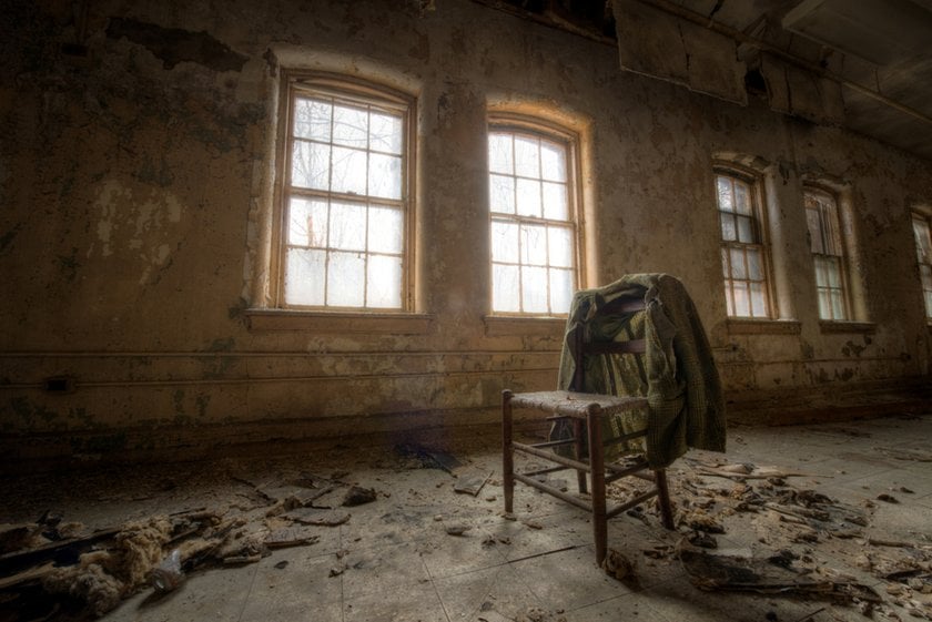 A jacket on a chair in an abandoned building | Skylum Blog
