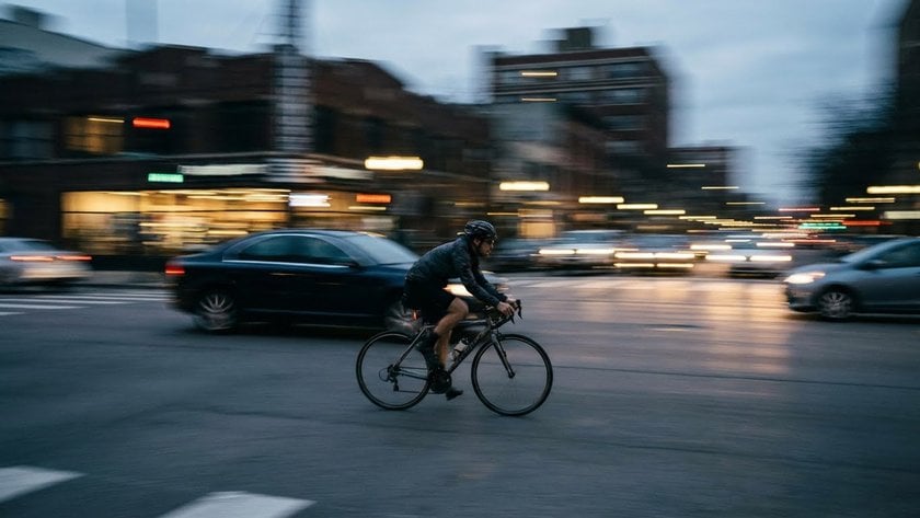 A photo of a cyclist with a blurred background | Skylum Blog