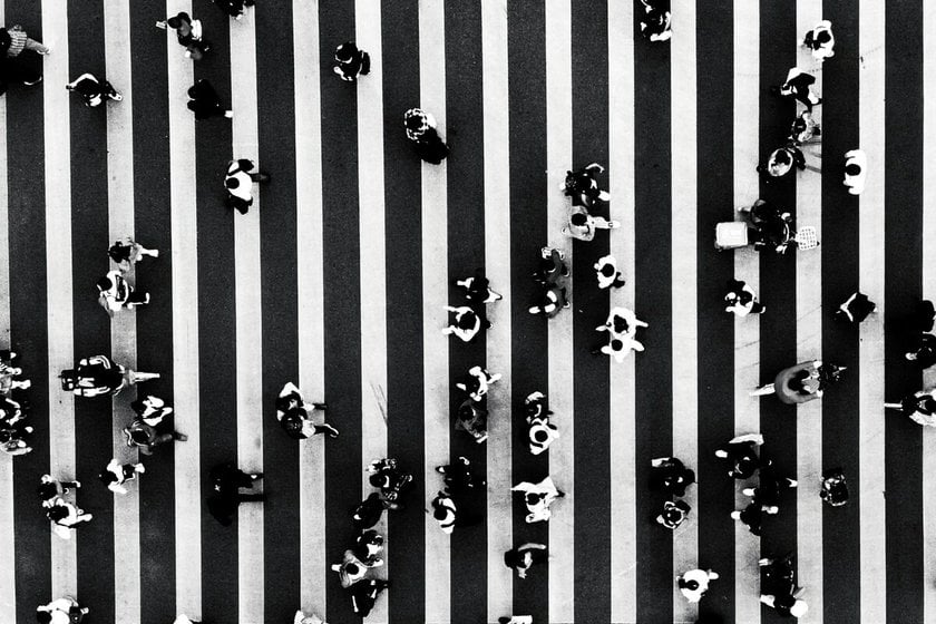 A photograph of a pedestrian crossing with people from above | Skylum Blog
