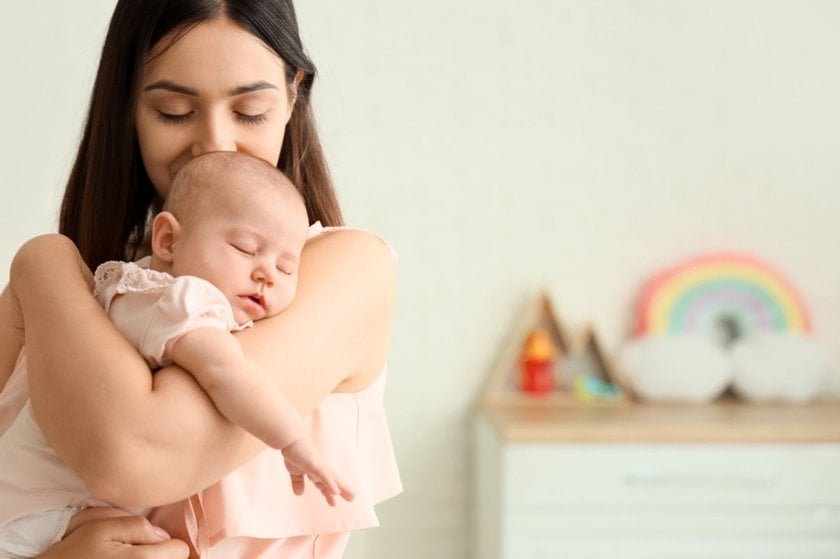 Mother with newborn in room | Aperty Blog