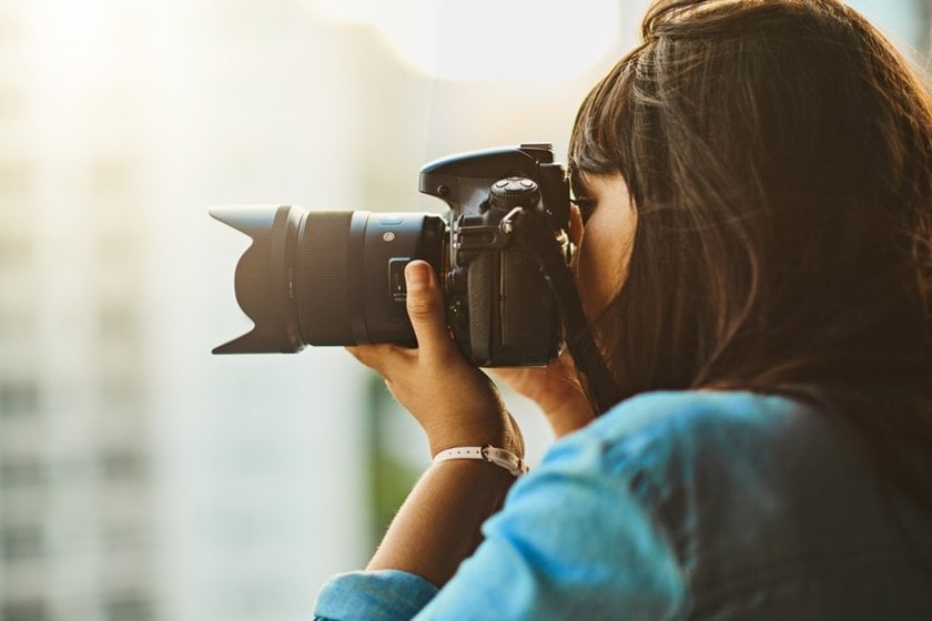 Photographer takes a photo | Aperty Blog