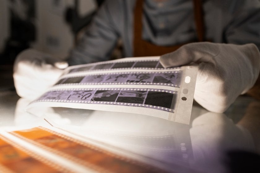 Photographic film in a person's hands | Aperty Blog