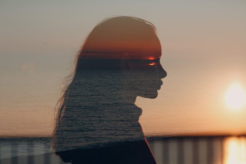 Double exposure portrait of a girl and sea background | Aperty Blog