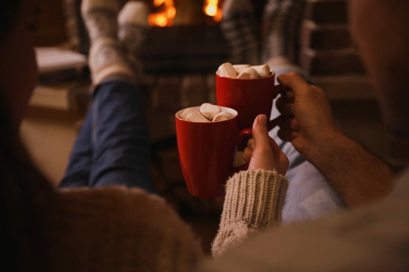 Photo of a Couple Holding Cocoa with Marshmallows | Skylum Blog