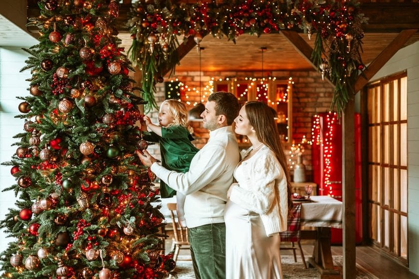 Beautiful Family Decorating a Christmas Tree Together | Skylum Blog