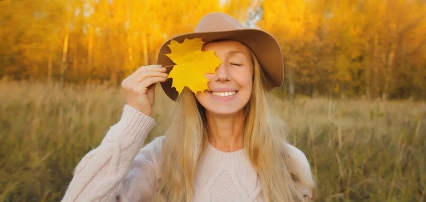 Woman with an autumn leaf | Skylum Blog
