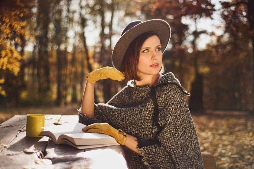 Portrait of a girl in a park under the bright sun | Skylum Blog