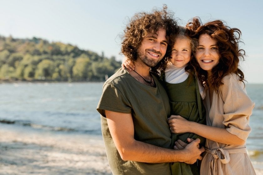 A photo of a family near the water in summer | Aperty Blog