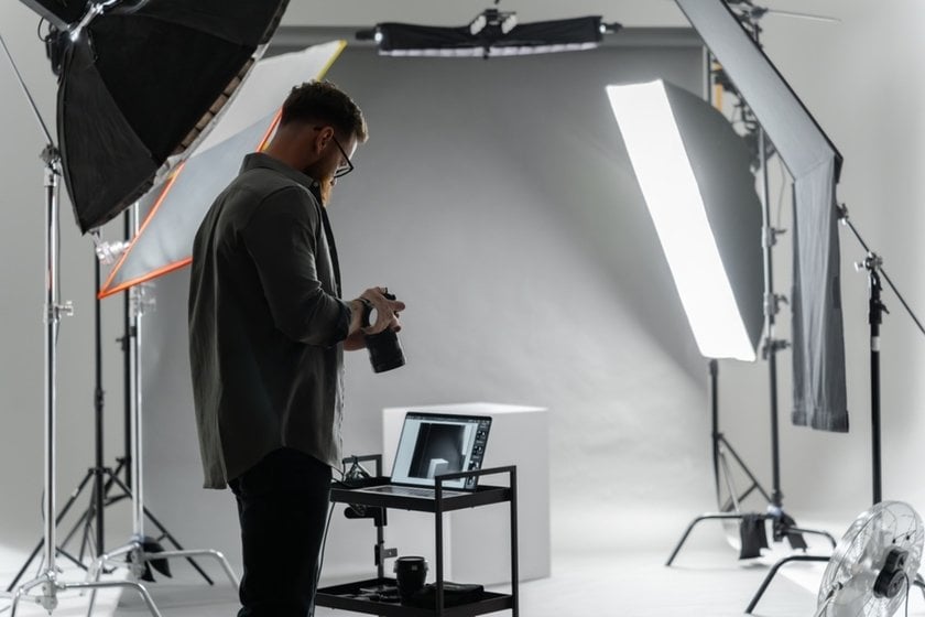 Photographer in a photo studio | Aperty Blog