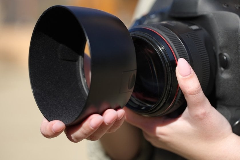 A photographer puts a protective frame on his camera | Aperty How To