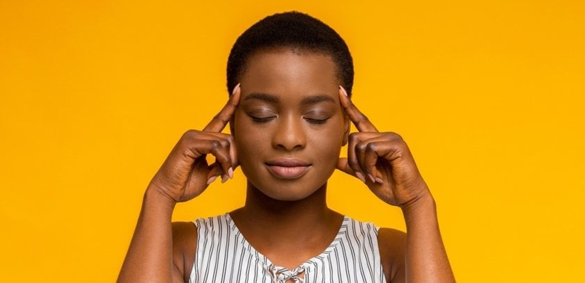 Portrait of a girl with hands at her temples | Skylum Blog