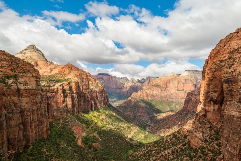 Mountains at noon under warm sunlight| Skylum Blog