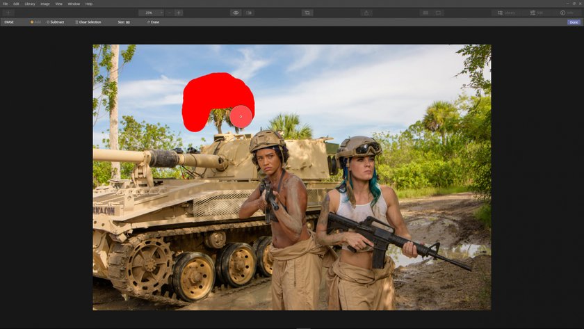 How to use the erase tool to edit distractions out of an image(3)