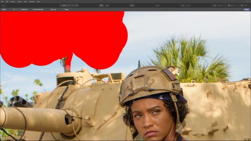 How to use the erase tool to edit distractions out of an image(4)