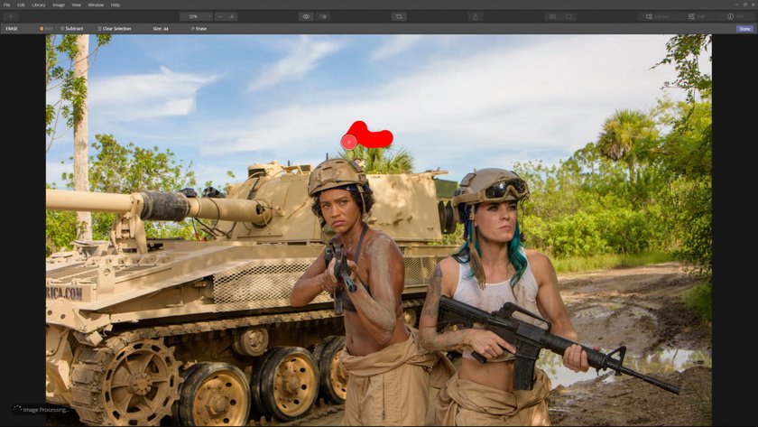 How to use the erase tool to edit distractions out of an image(6)