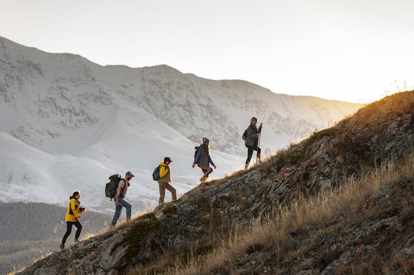 Group of Tourists Hiking to the Summit | Skylum Blog