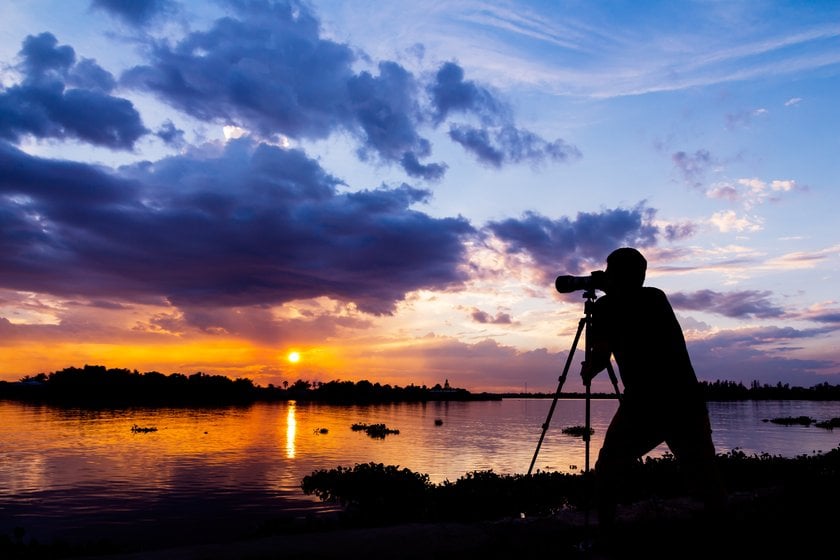 Man Capturing an Incredible Sunset Photo | Skylum Blog