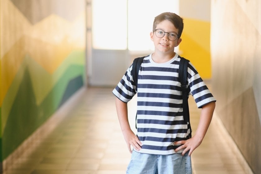 Schoolboy in a bright corridor | Skylum Blog