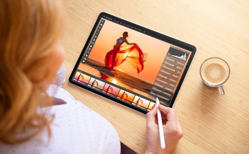 Photographer edits photo | Skylum Blog