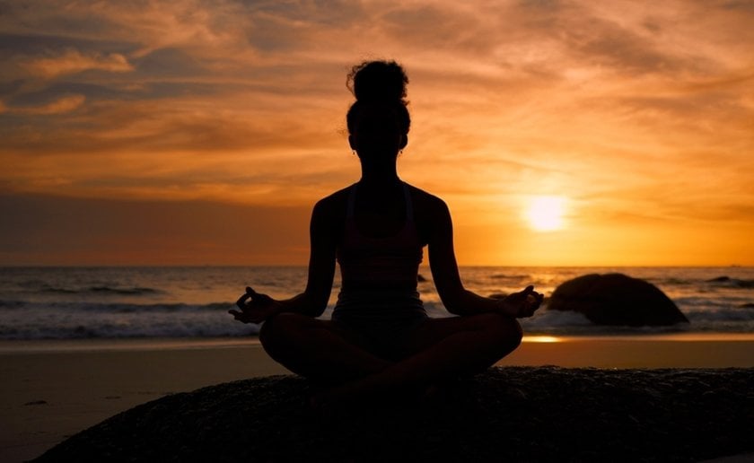 Silhouette of a girl at sunset | Skylum Blog