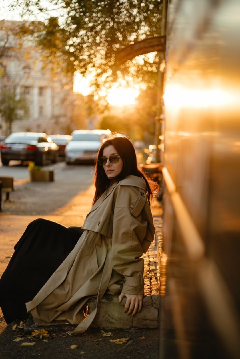A girl on an autumn street at golden hour | Skylum Blog