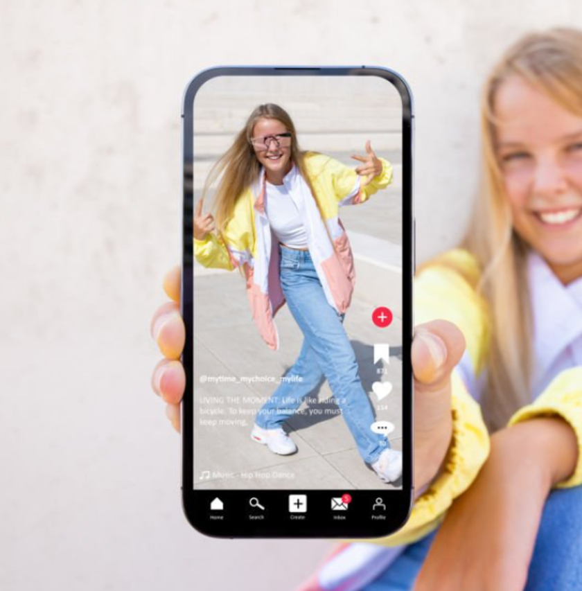 The girl shows the content | Skylum Blog