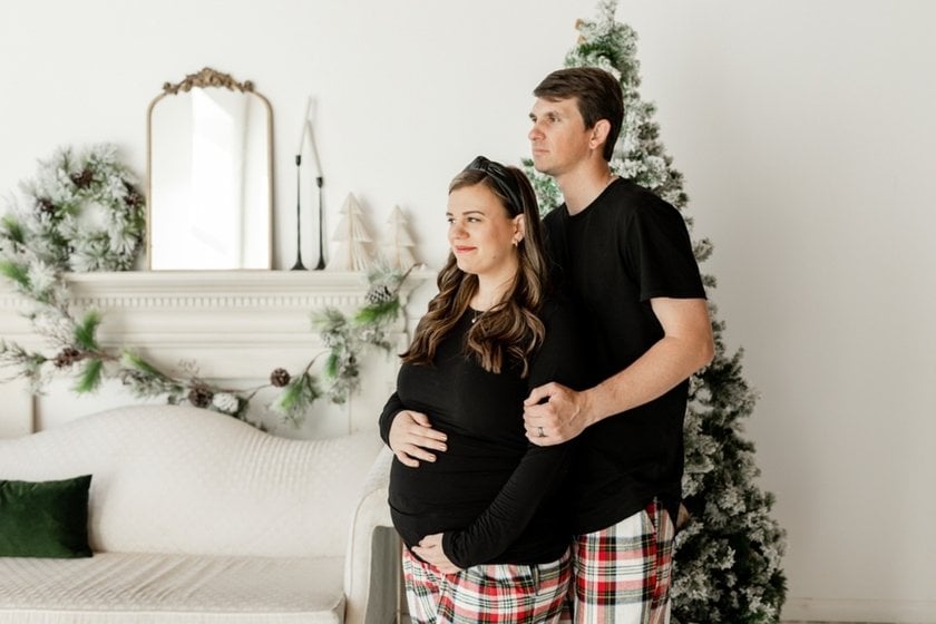 A man and his pregnant wife look into the distance | Skylum Blog