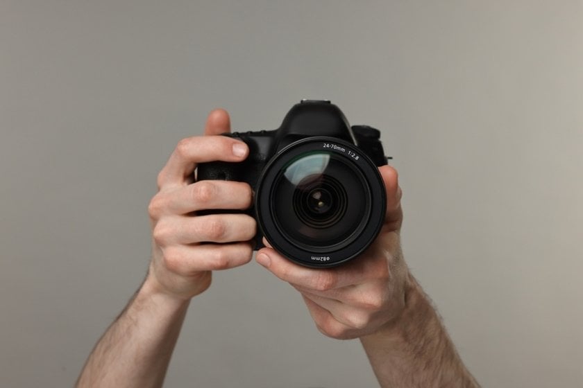 Camera in the hands of the photographer | Skylum Blog