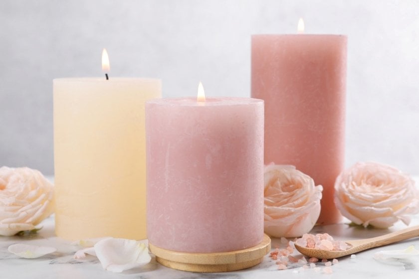 Lit pink candles with roses | Skylum Blog