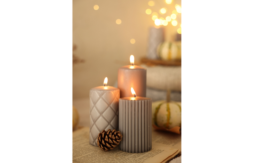Lit candles with a blurred background | Skylum Blog