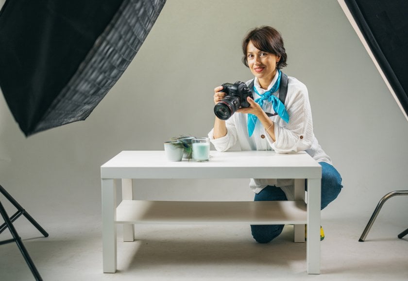 A photographer takes a photo of candles | Skylum Blog