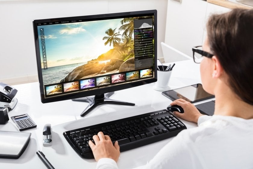 A girl edits a photo | Skylum Blog