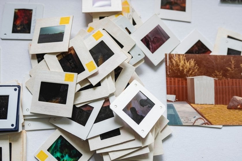 Antique color photographs on the table | Skylum Blog