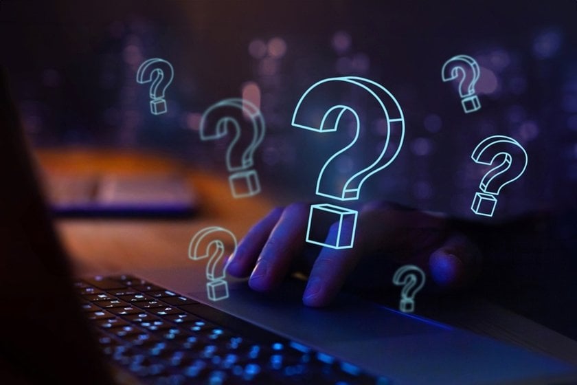Question marks above a laptop | Skylum Blog