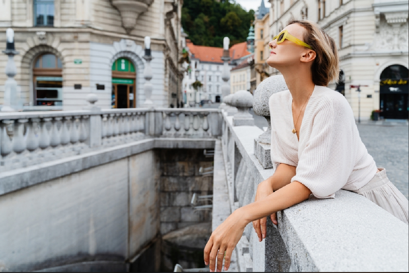 A photograph of a girl on the street without passers-by | Skylum Blog