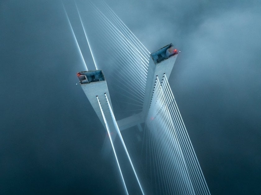 A foggy drone photo of the bridge | Skylum Blog