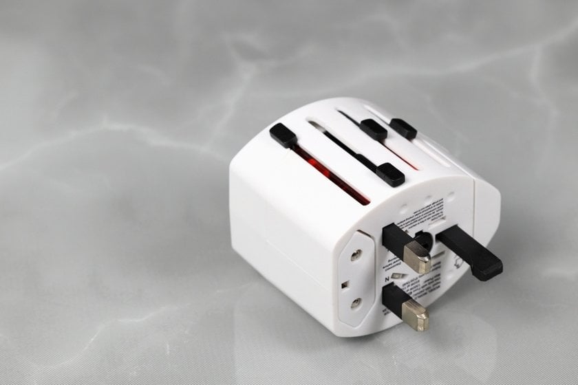 White travel adapter | Skylum Blog