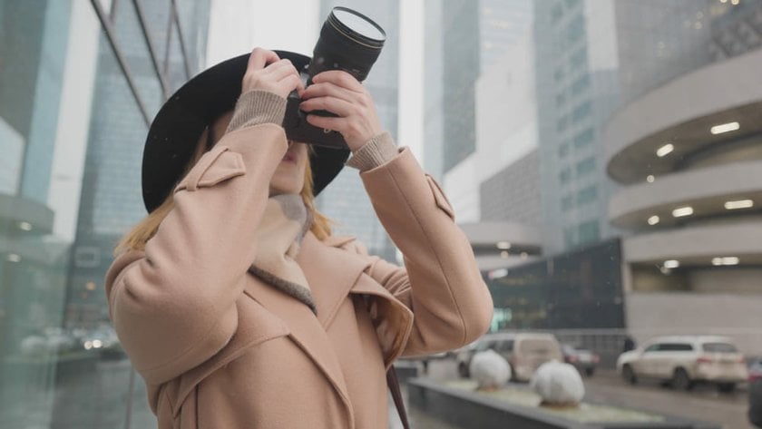 Woman Photographing a Modern Building | Skylum Blog