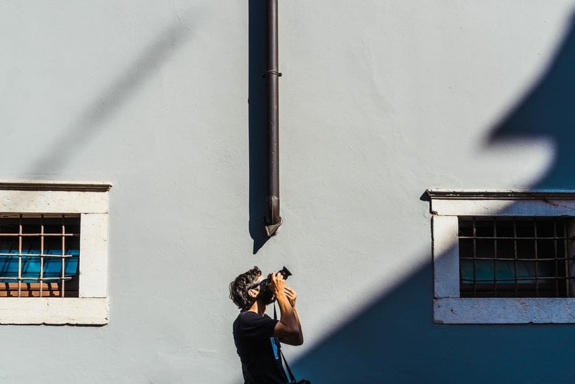 Man Capturing an Architectural Shot | Skylum Blog