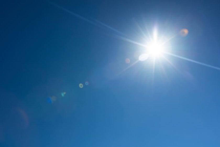 Photo of the Sun with Rays in a Blue Sky | Skylum Blog