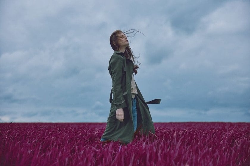 Photo of a Girl in a Field with Unusual Color Treatment | Skylum Blog