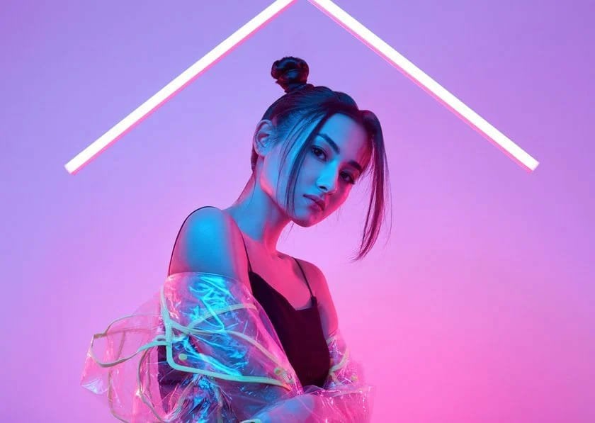 Portrait of a Girl with Neon Pink Lamps | Skylum Blog