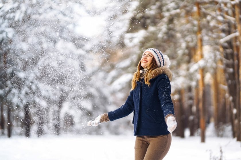 Cheerful Girl Shoveling Snow | Skylum Blog