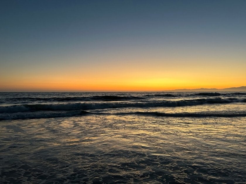 A photo of the ocean during blue hour | Skylum Blog