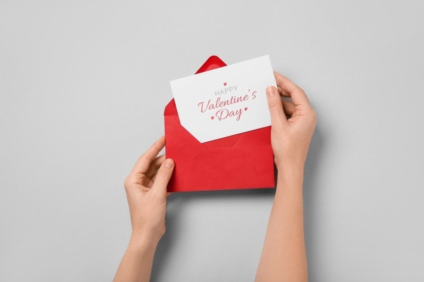 Hands holding a clean white card with a red heart| Skylum Blog