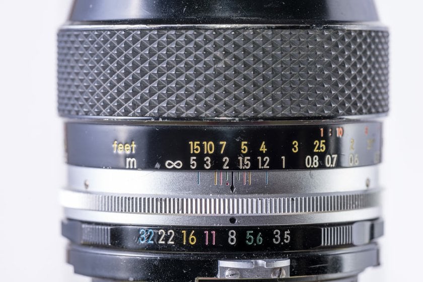 Close-Up Photo of a Lens with Markings | Skylum Blog