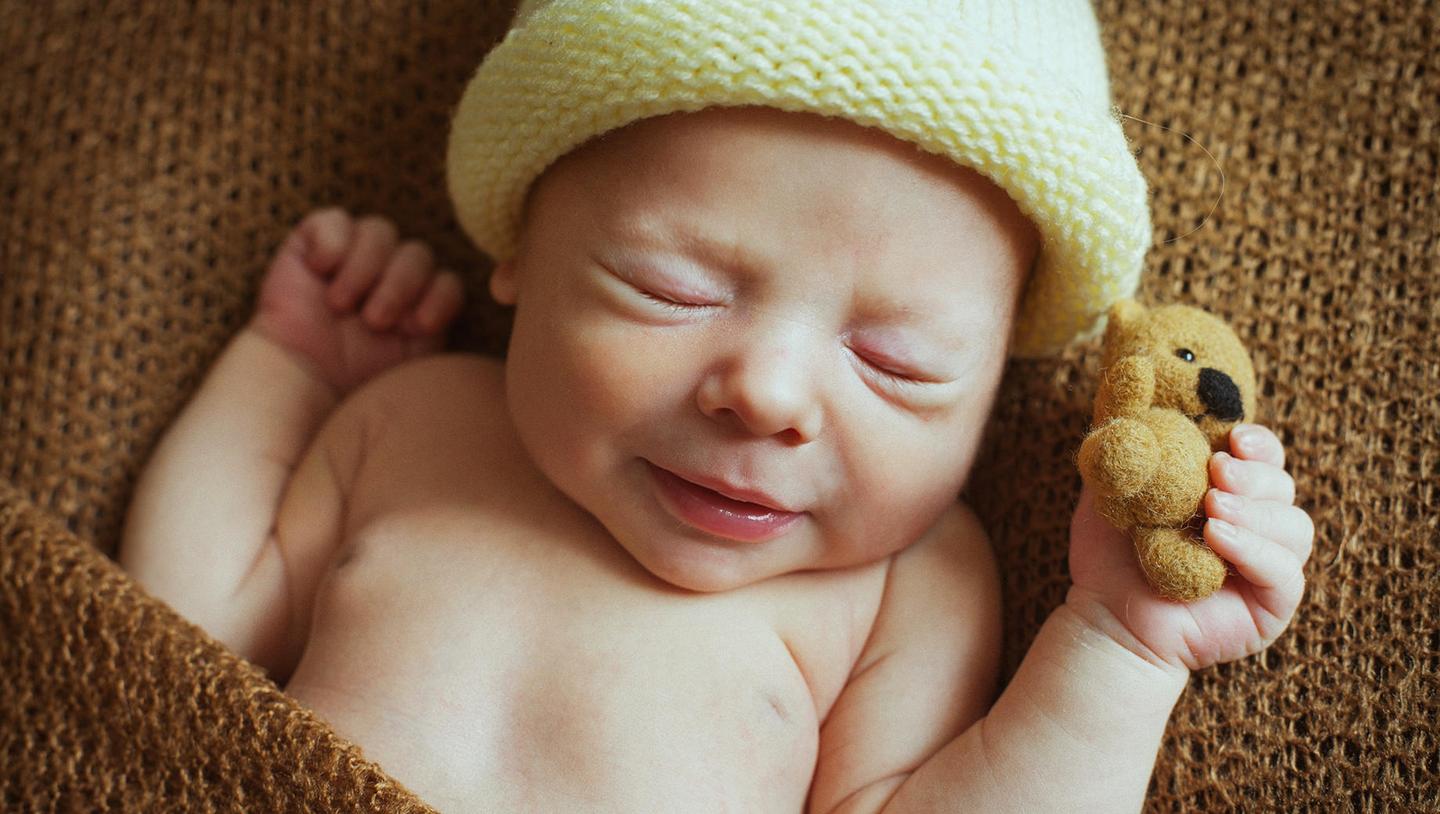 NEWBORN SMILES — slide 1